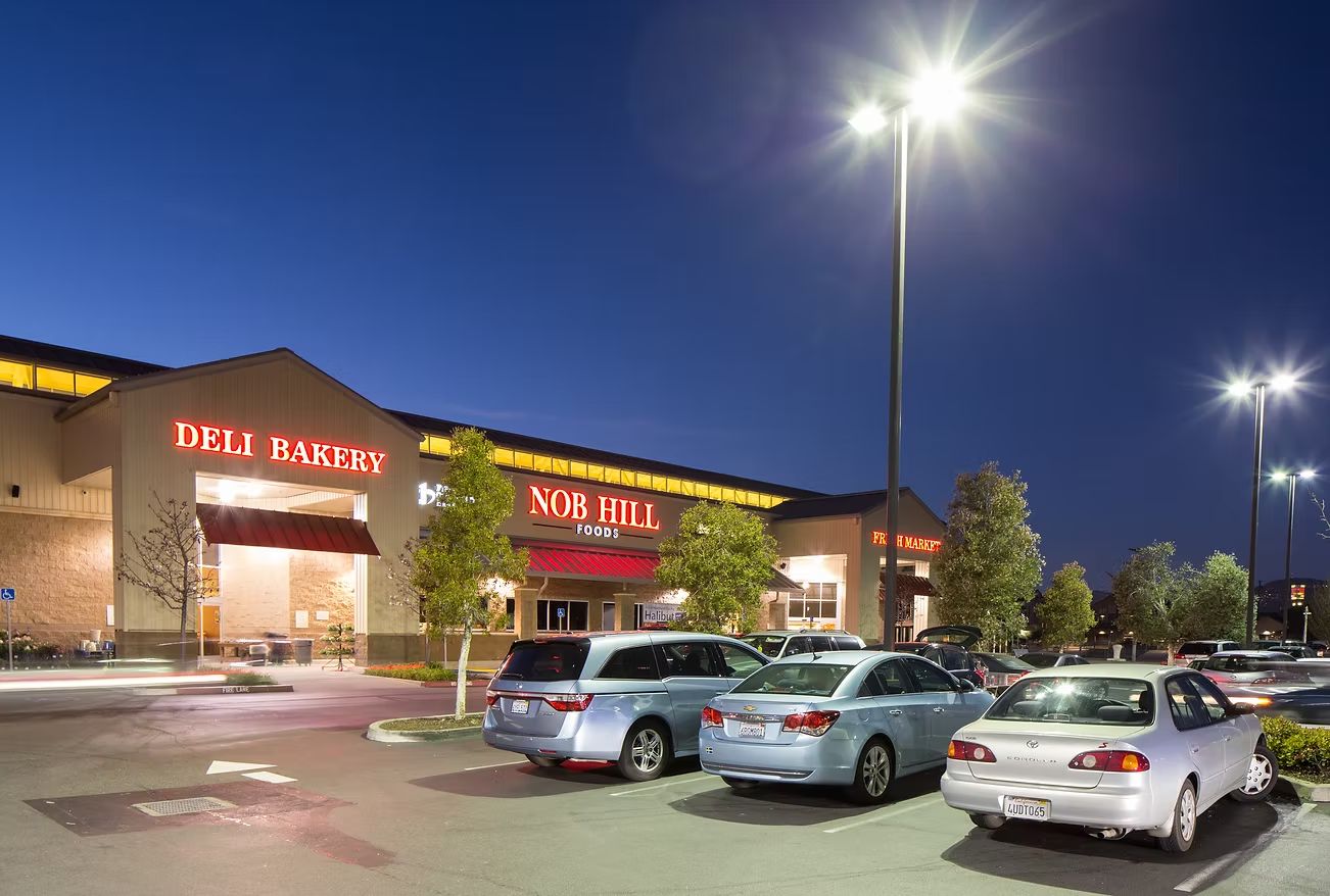 Nob Hill Foods, the anchor grocery at Alameda Bridgeside Center, at night